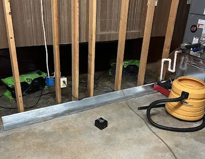 Flood cut drywall and drying equipment in a Woodstock, GA basement